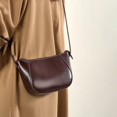Donna Puo model Esme bag crafted from premium genuine cow leather in brown