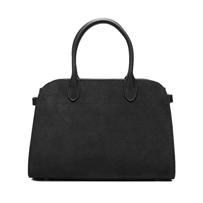 Close-up of black genuine cow leather bag serena Donna Puo handbag