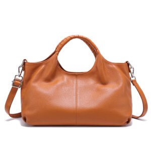 Close-up view of genuine cow leather grain in warm camel color