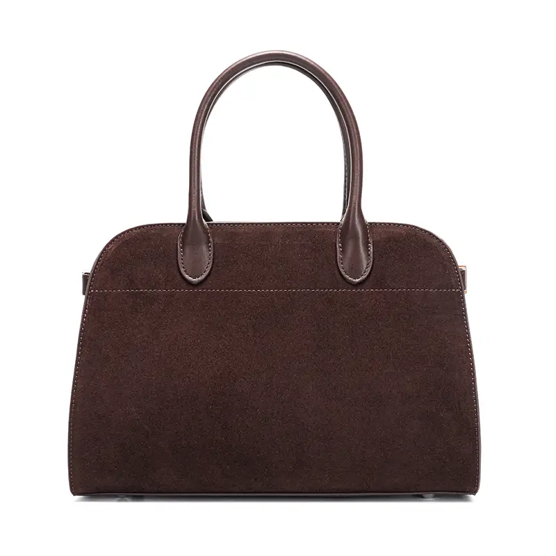 Close-up of brown genuine cow leather bag serena Donna Puo handbag