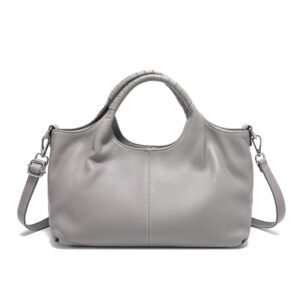 Close-up view of genuine cow leather grain in grey color