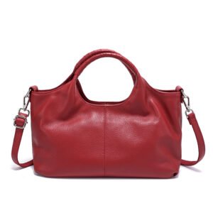 Close-up view of genuine cow leather grain in red color