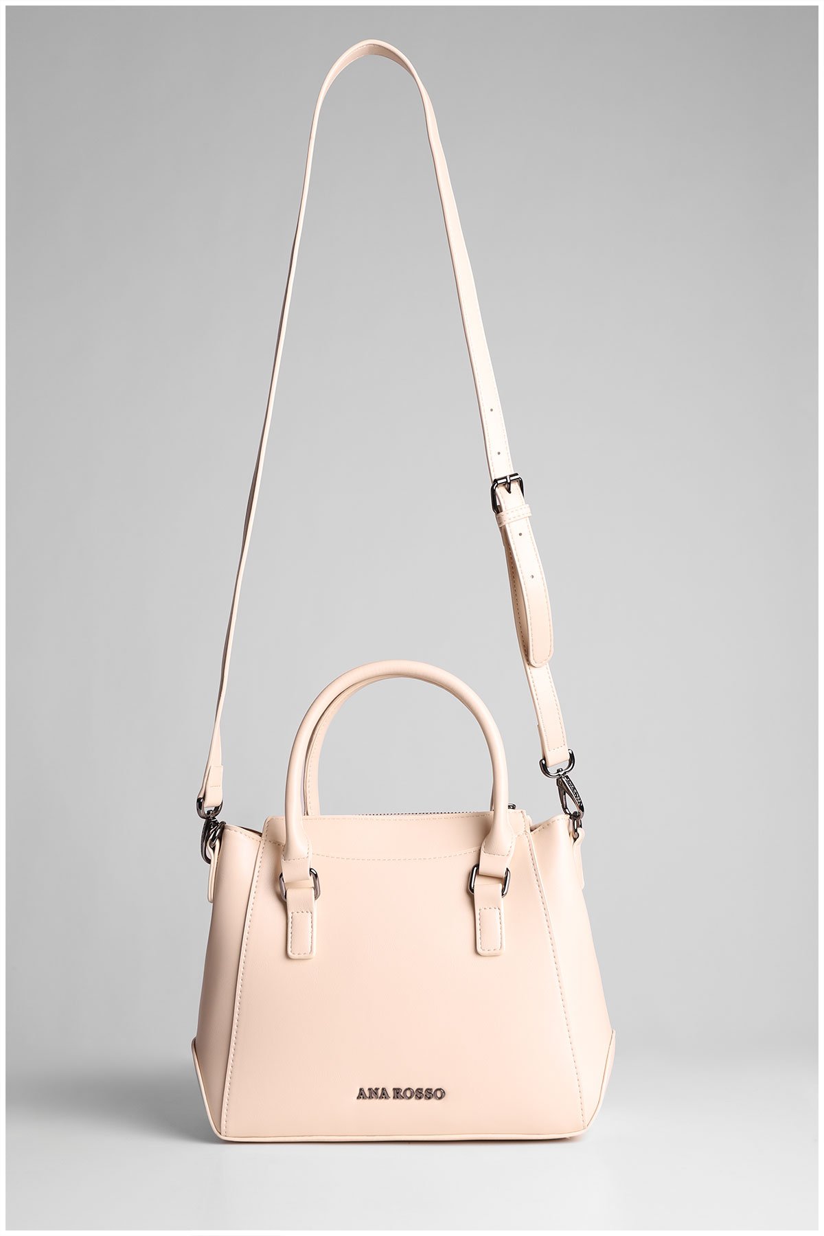 beige woman handbag with a strap