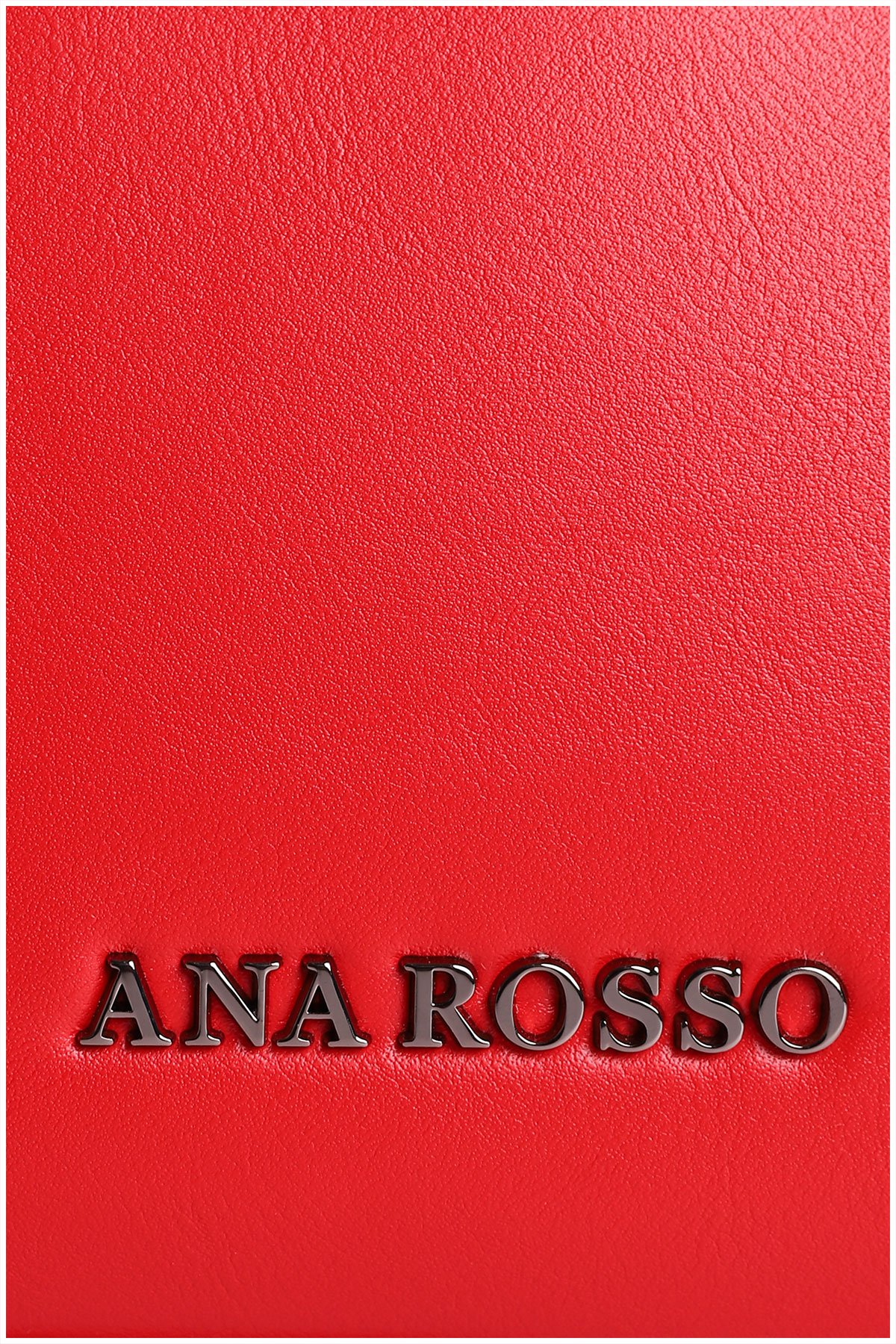 metal details on a red woman handbag