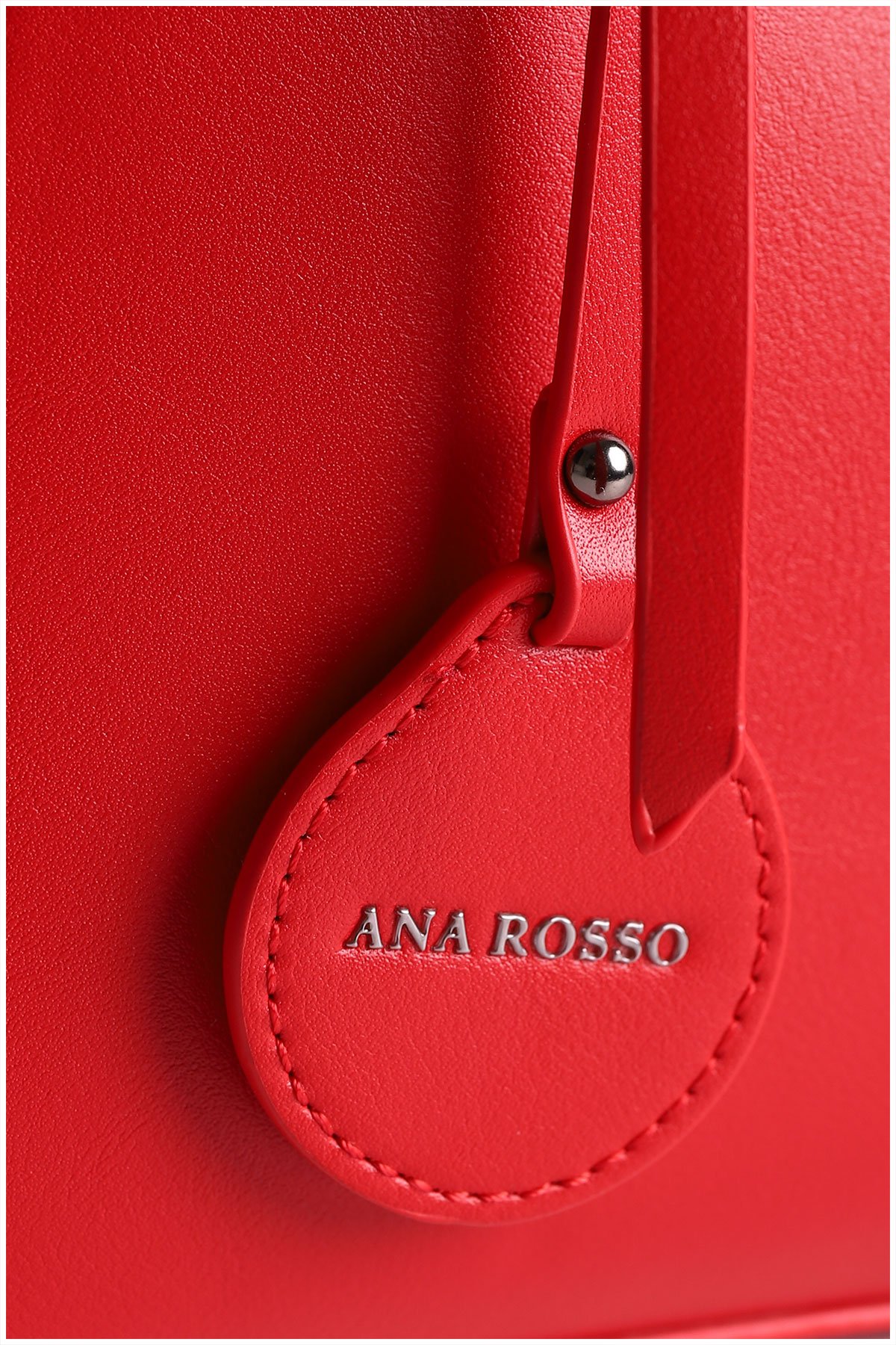 details on a red woman handbag