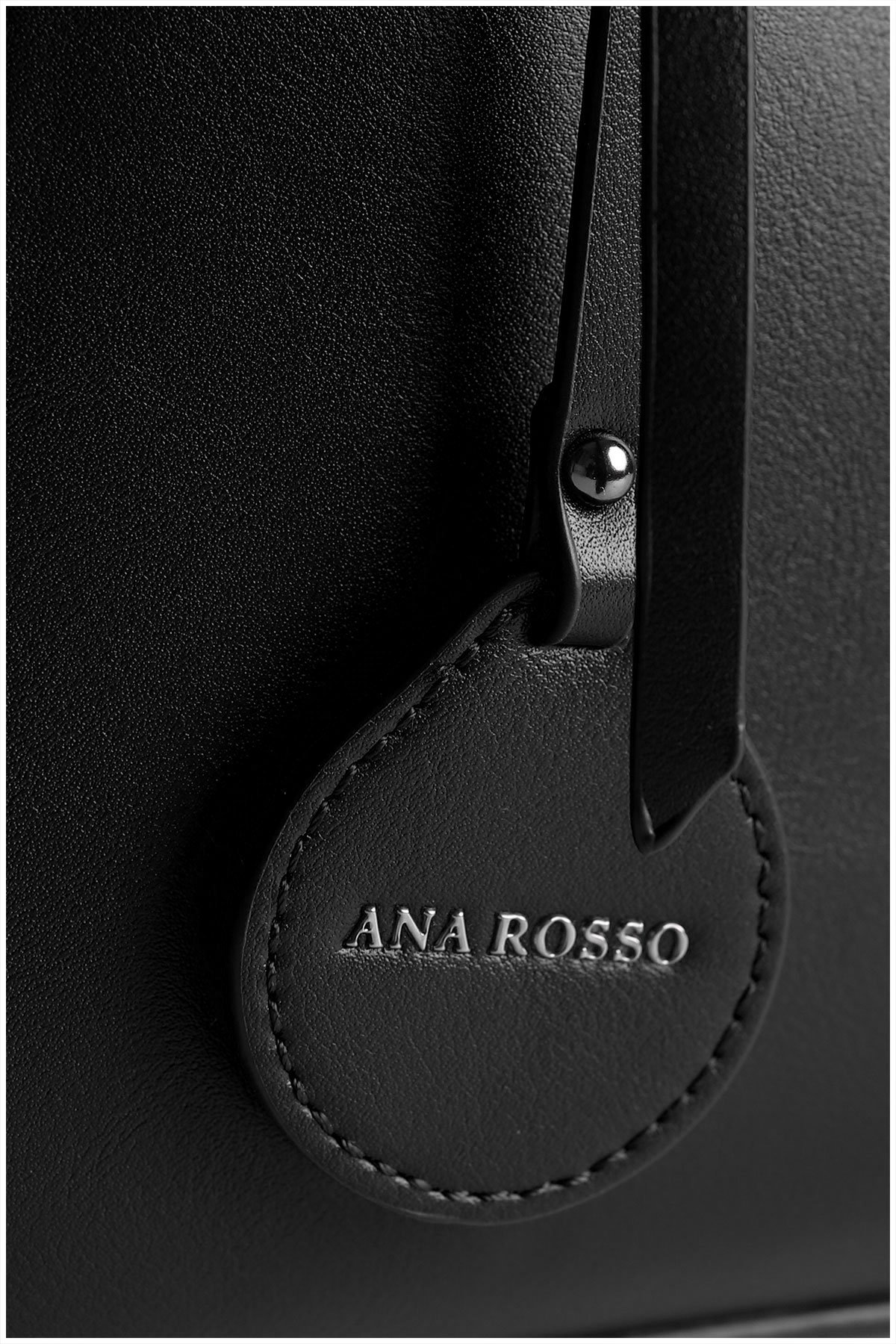 details on a black woman handbag