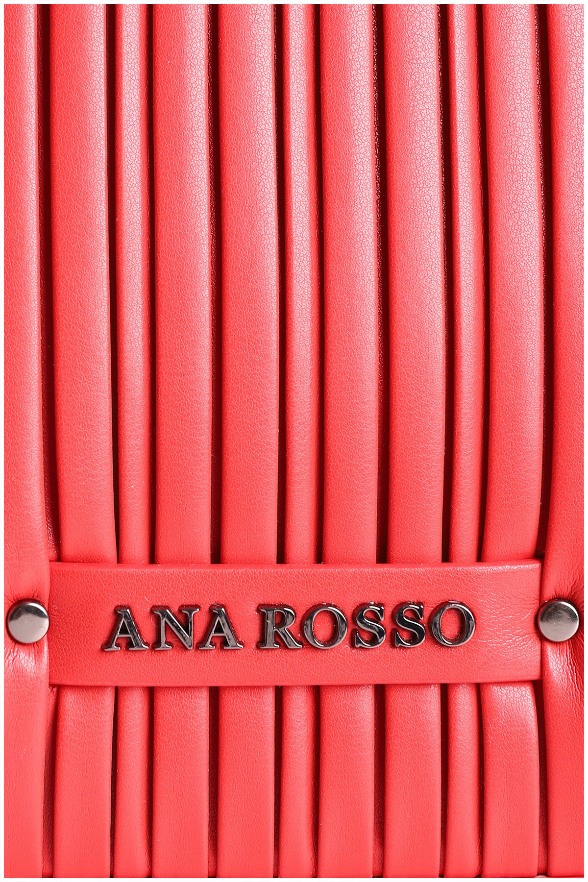 metal details on a red woman handbag