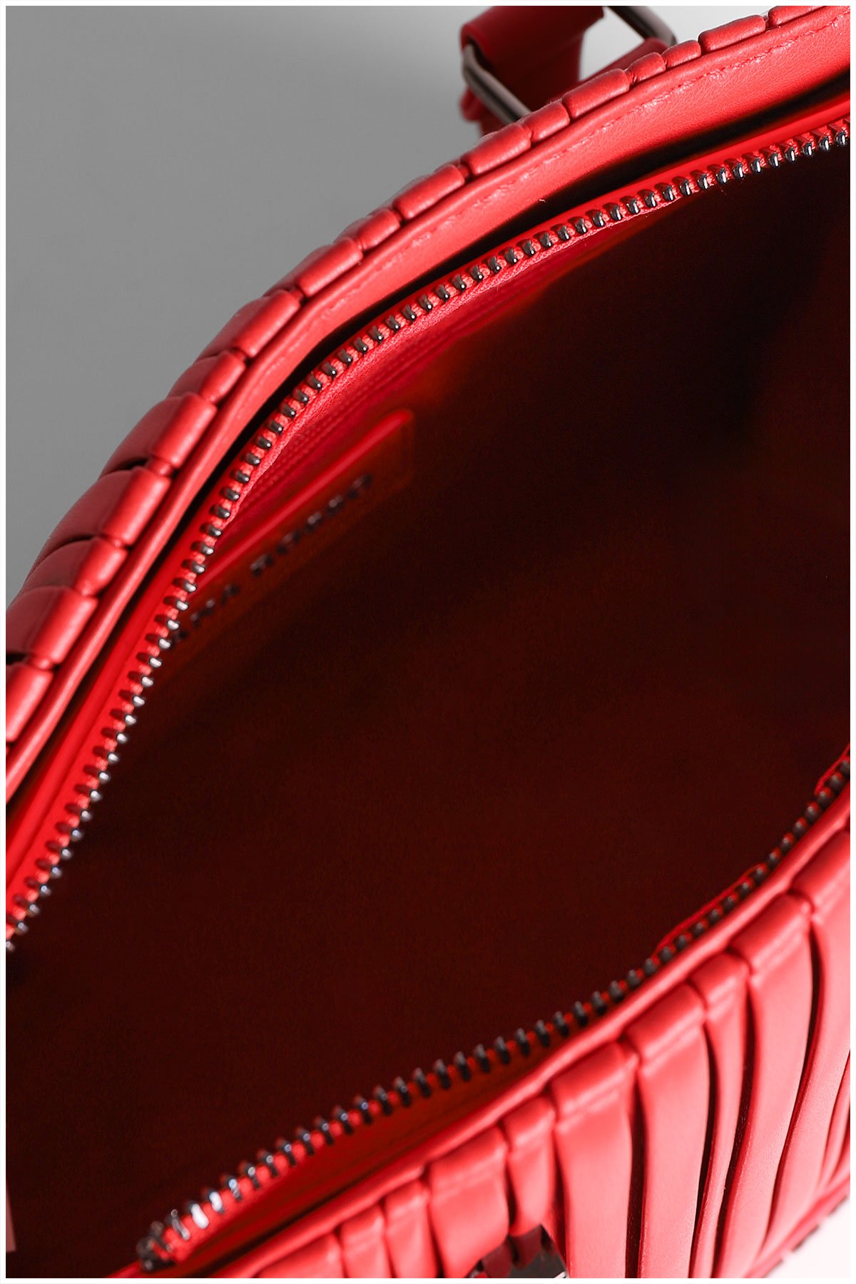 inside of a red woman handbag