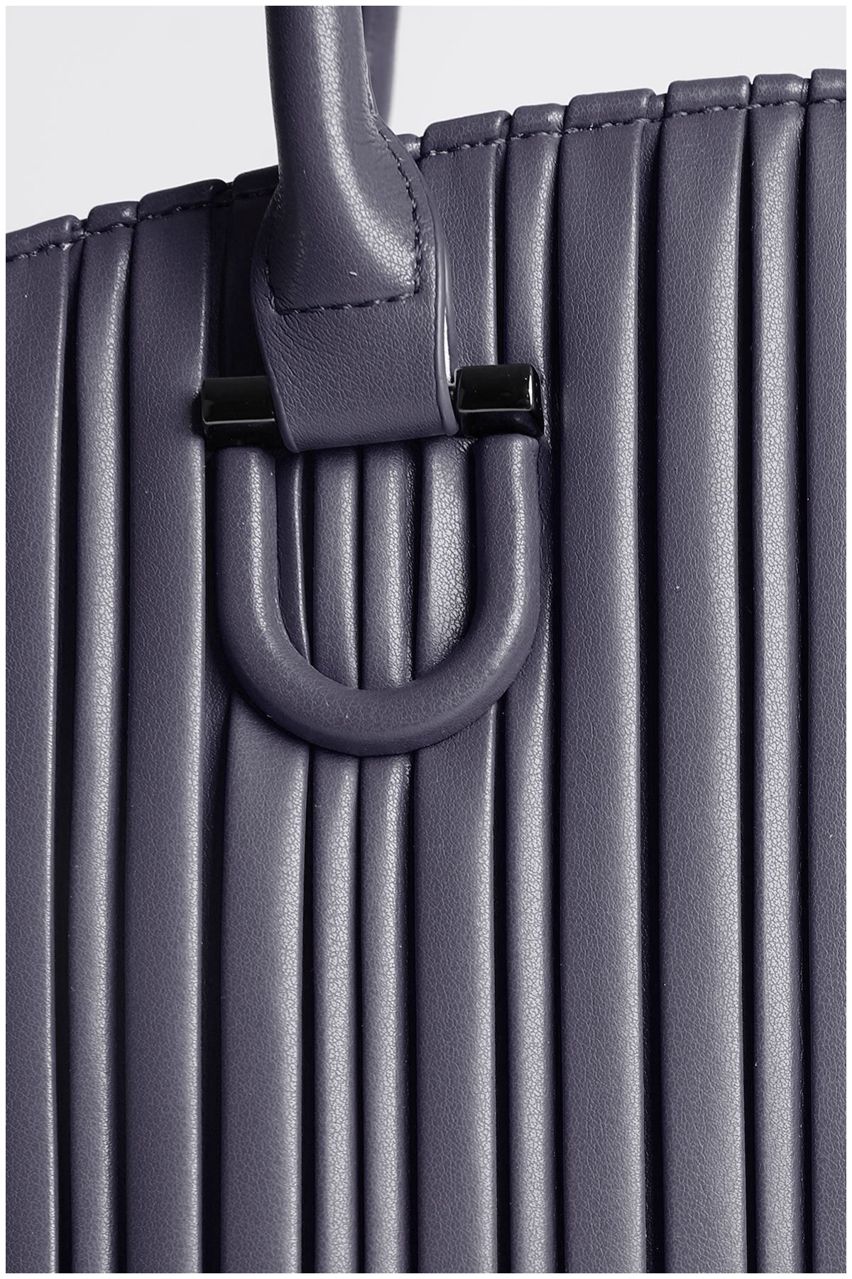 details on a navy blue woman handbag